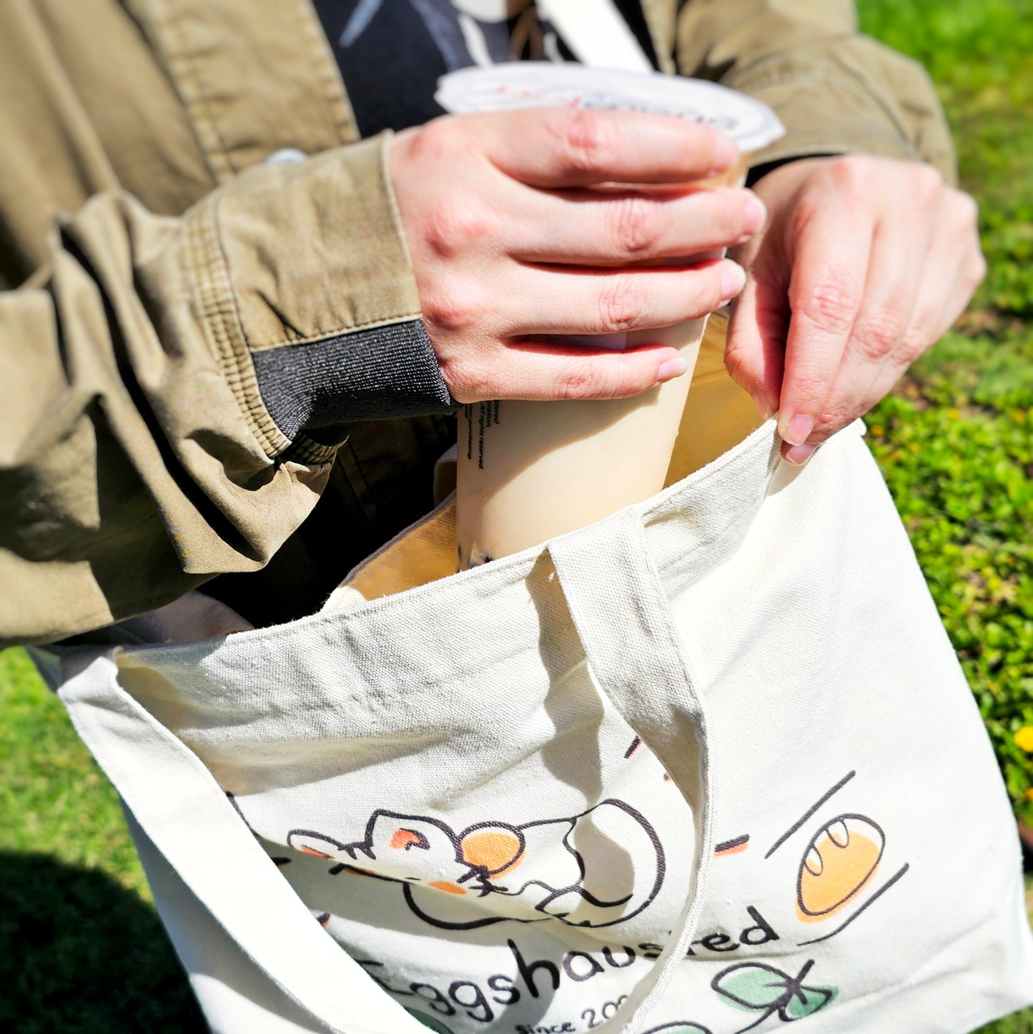 Eggshausted Tote Bag with Bottle Pocket